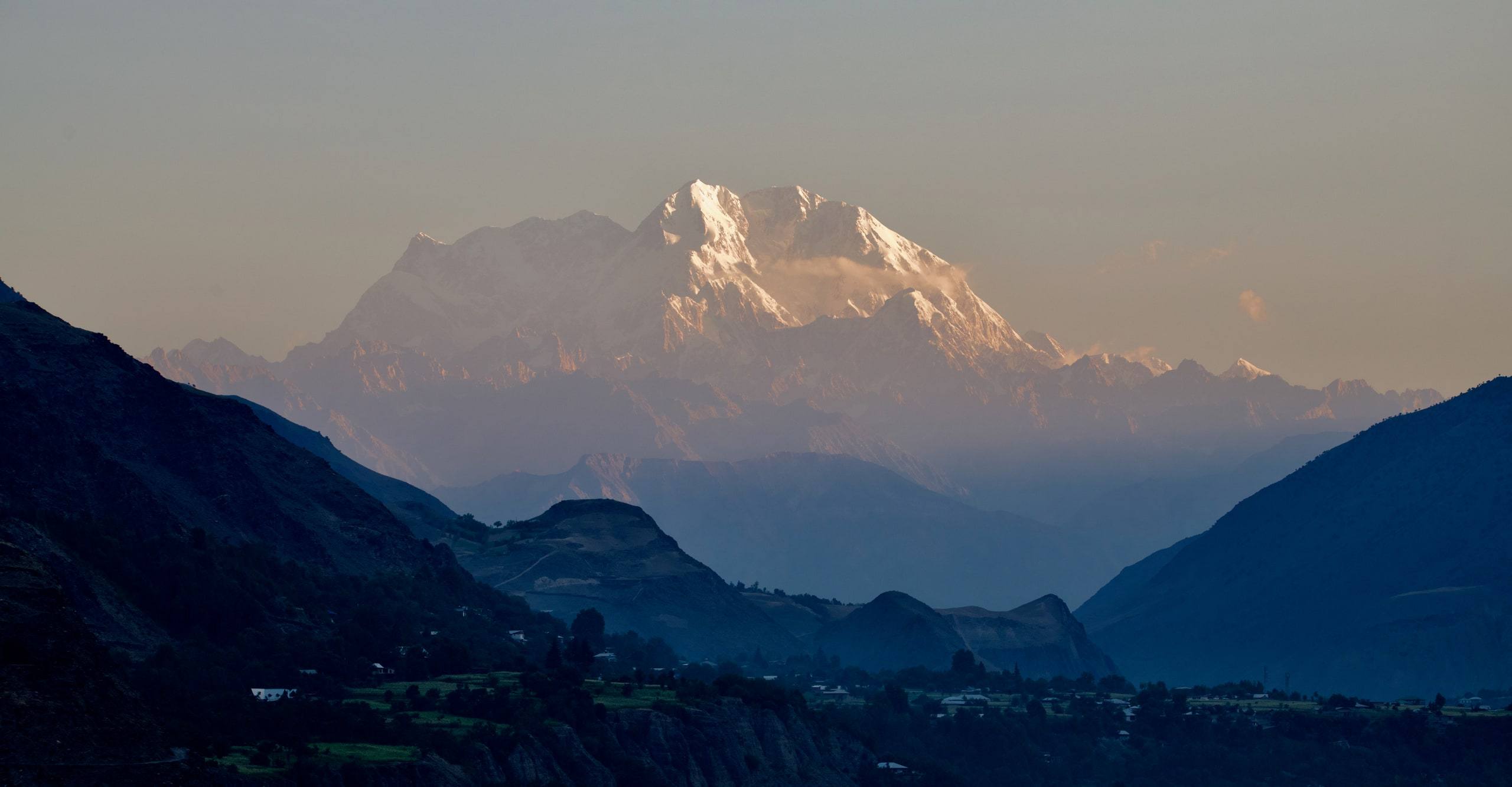 Snow-covered Hindu Kush ridge above the Chitral Valley in winter light